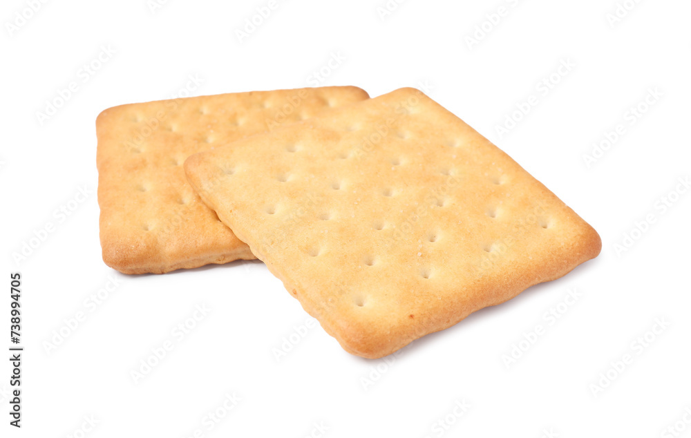 Two crispy crackers isolated on white. Delicious snack