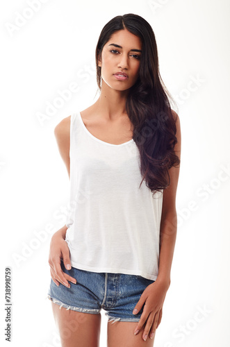 Fashion, portrait and confidence with Indian woman, stylish clothes and model isolated on a white studio background. Face, person and girl with streetwear and casual outfit with beauty and trendy