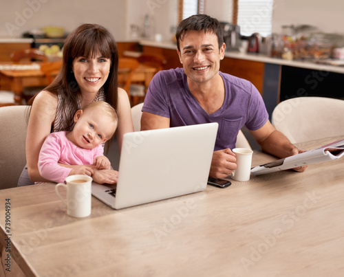 Portrait, laptop and happy family with baby in home, relax and drinking coffee at table in the morning. Face, parents and toddler on computer for learning, online education and bonding with child