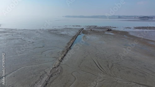 Beach scenery with mudflats visible
