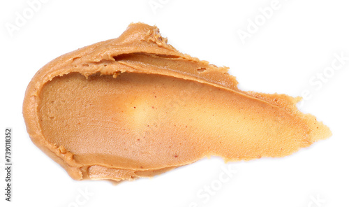Smear of tasty nut butter isolated on white, top view photo