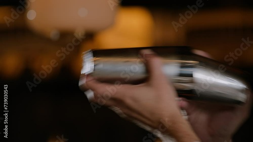 Bartender shaking a cocktail