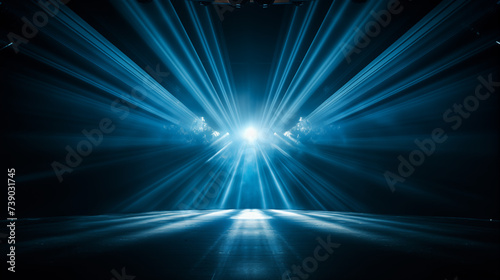 Blue stage curtain with spotlights. scene, stage light with colored spotlights and smoke. Stage on the dark floor with lights on the perimeter. theater stage Art concept.