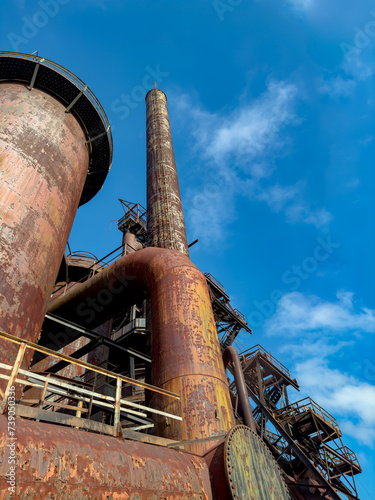 Фотография Catwalks, Piping, furnaces and other industrial items grace the old and rusting