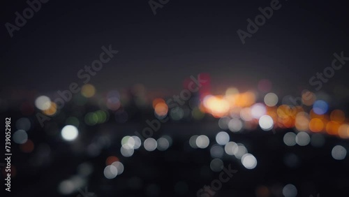 Blurred of night city skyscraper and tower lights bokeh , Soft Focus , Metropolis Backgound wallpaper for movie or documentary romantic mood concept photo
