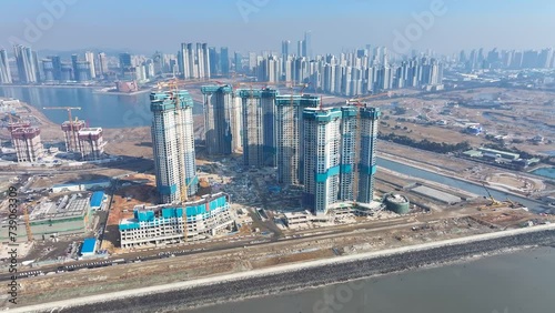 Asia Aerial view of Songdo Zyderstar high-rise apartment construction site in Incheon, South Korea. photo