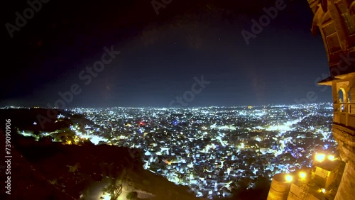 panning shot showing the night cityscape view of jodhpur jaipur city from mehrangarh fort a historic royal destination shot from terrace a luxury dining destination photo