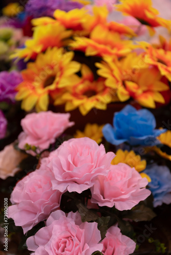 Colorful fake, articifial flowers on sale in a local market in the Seychelles.