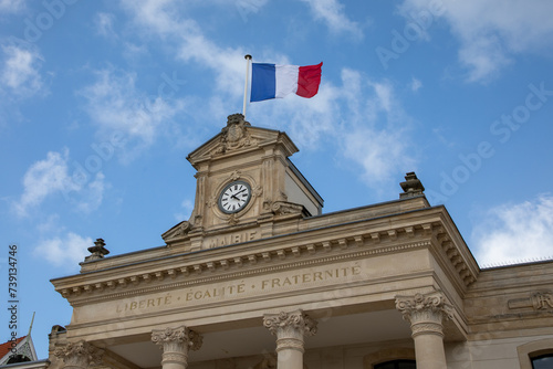 Fototapeta Naklejka Na Ścianę i Meble -  Arcachon city French flag with mairie liberte egalite fraternite france text sign facade building mean town hall and freedom equality fraternity in france