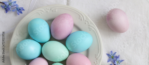 Easter concept  painted eggs in pastel colors. flat lay  top view. copy space.