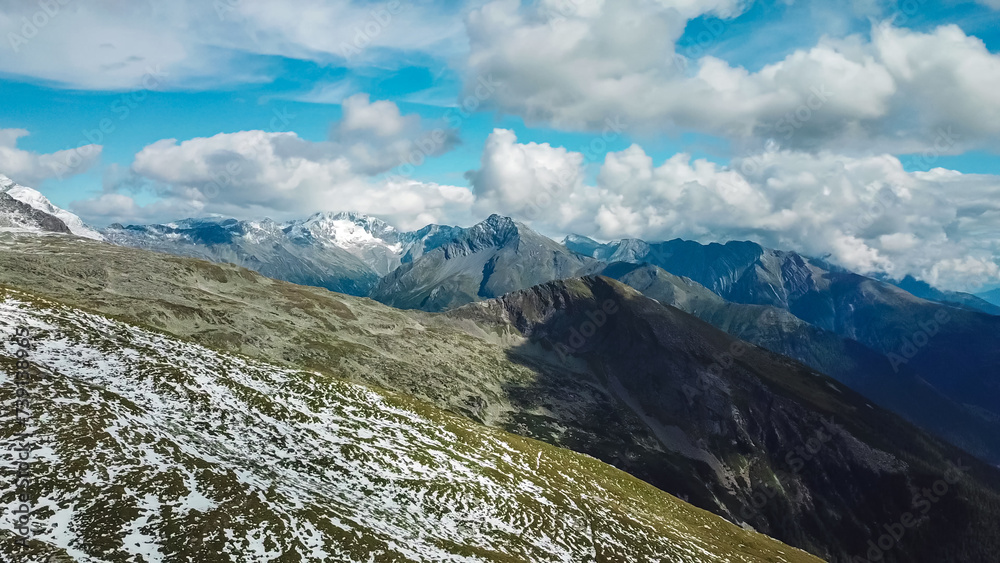 Aerial view of majestic mountain peak Hochalmspitze in High Tauern National Park, Carinthia, Austria. Idyllic hiking trail Austrian Alps. Wanderlust paradise. Sense of exploration. Nature escape