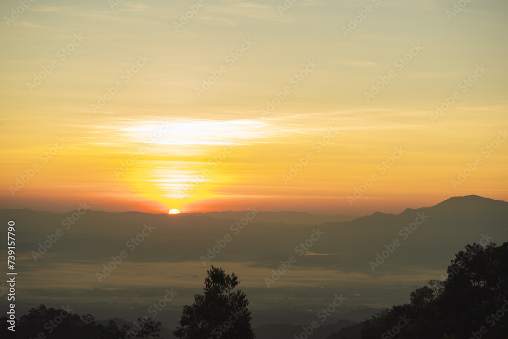 landscape and travel concept with sunrise and layer of mountain background