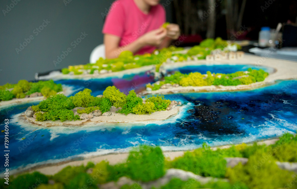 The process of making the art decor of epoxy resin, natural stones and moss The process of making the art decor of epoxy resin, natural stones and moss