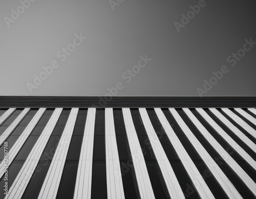 Modern building with wavy futuristic design, low angle view of abstract curve lines and sky