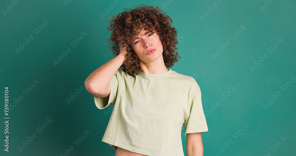 Adult woman with her hands on her head because she has forgotten something