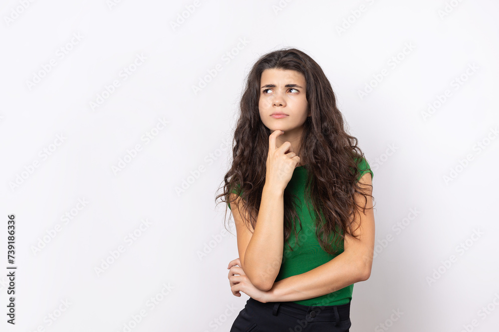 Portrait of a beautiful young woman thinking, isolated on white background Portrait of a beautiful young woman thinking, isolated on white background