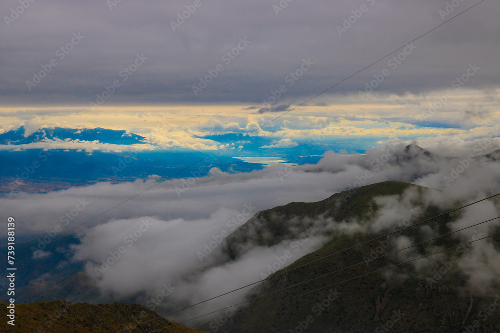 Fototapeta premium clouds over the mountains