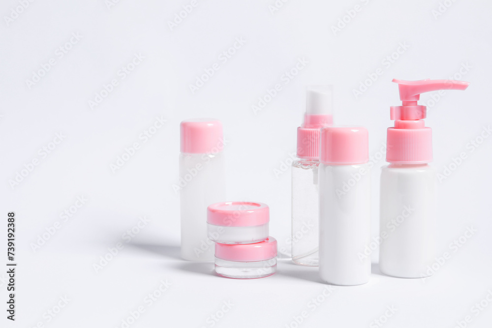 Cosmetic travel kit on white background. Space for text Cosmetic travel kit on white background. Space for text