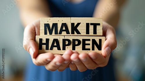 Motivational woman holding  make it happen  sign, success concept on blurred background.