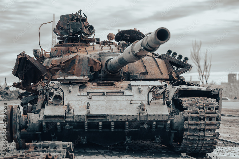 damaged military tank on a city street in Ukraine damaged military tank on a city street in Ukraine
