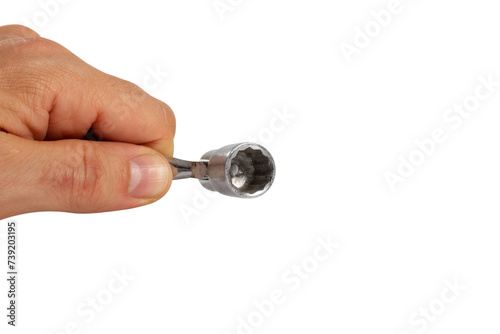 Hand holding flex head socket wrench. Isolated with clipping path. photo
