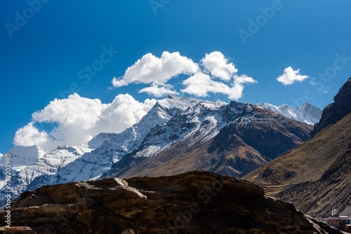 Snow mountains of Himalaya with blue sky and clouds