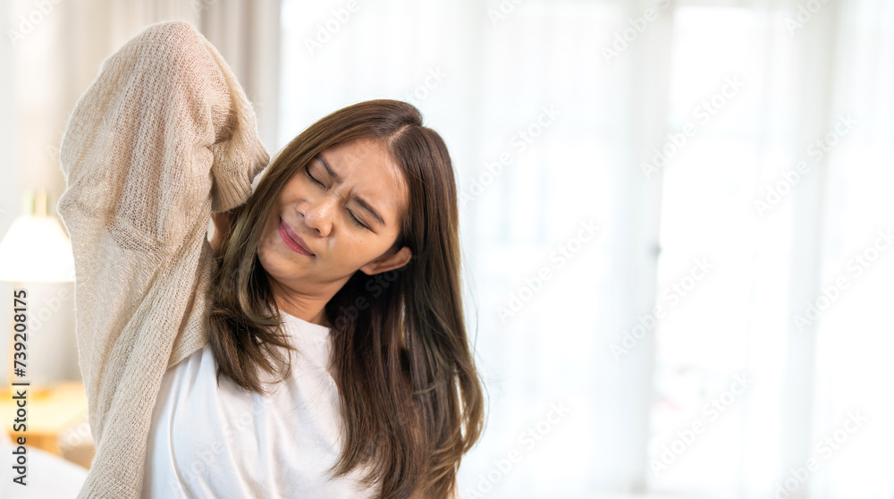 Woman unhappy holding neck pain with suffering from painful shoulder, Upper arm pain, office syndrome, muscles problem, musculotendinous strain, hurt, massage, inflammation, Woman healthcare. Woman unhappy holding neck pain with suffering from painful shoulder, Upper arm pain, office syndrome, muscles problem, musculotendinous strain, hurt, massage, inflammation, Woman healthcare.