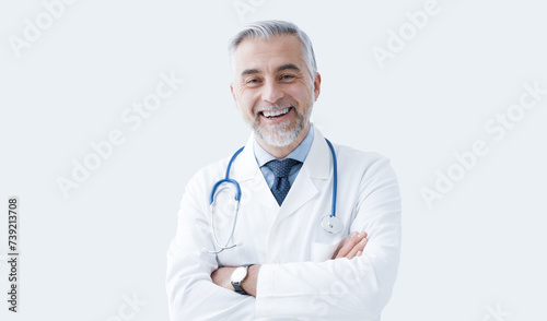Confident doctor posing and smiling