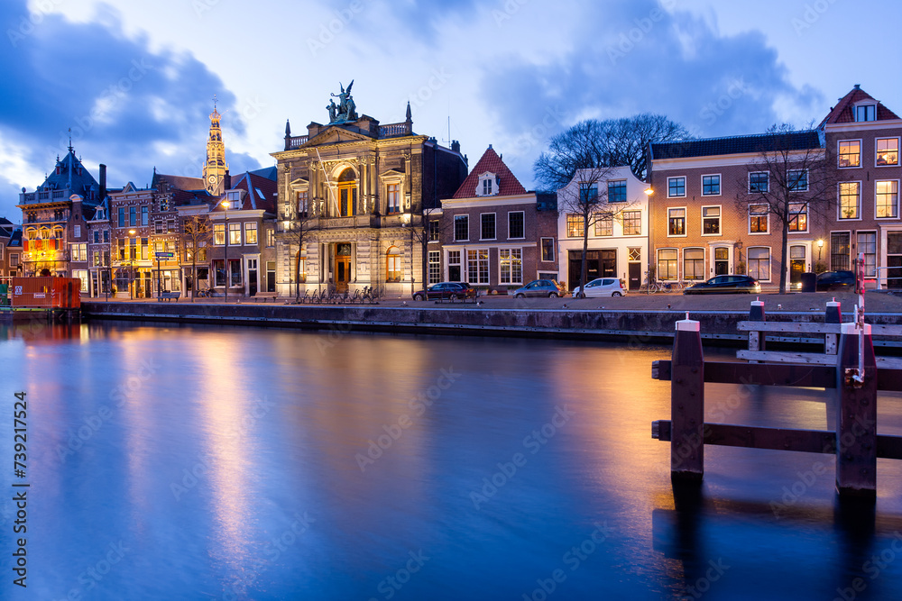 Historic houses at the Nieuwe Gracht canal in Haarlem Netherlands