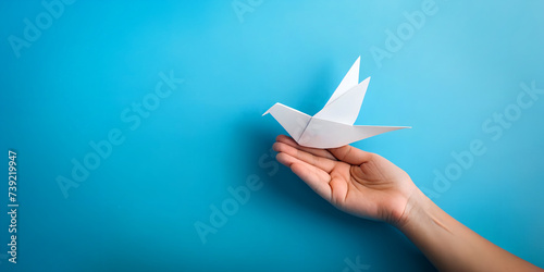 Hand concept with paper bird ideas in blue background. Freedom of thought and communication of concern. Business, Comparison, Illustration, Investment, Development, 3D Rendering photo