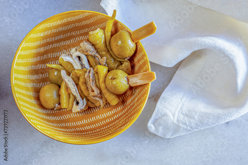 Spanish tapa Gilda with chilli olive and anchovies photo