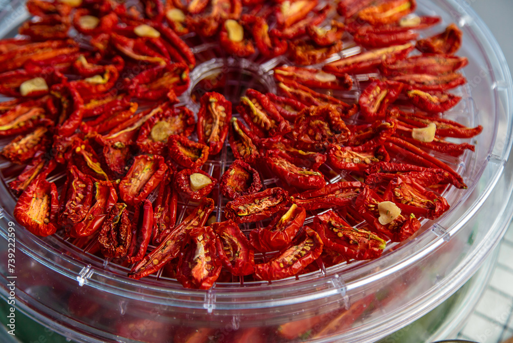 Sun-dried tomatoes are prepared for the winter. selective focus. Sun-dried tomatoes are prepared for the winter. selective focus.