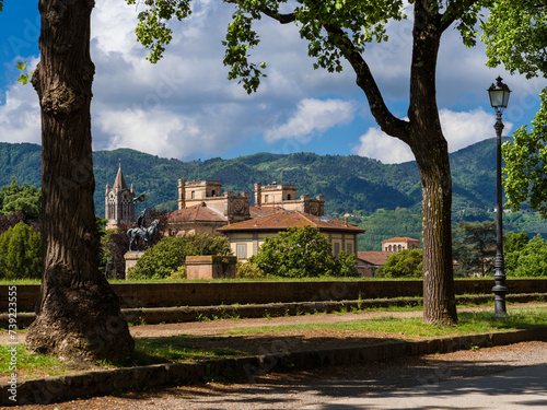 View of San Concordio old district and Pisan Mountain Range from Lucca city walls public park