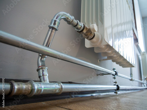 Fragment of a heating system using stainless steel pipes