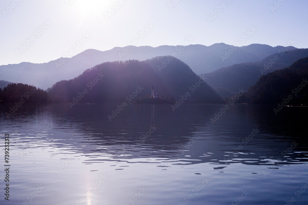 fog on the Bled lake with island on background