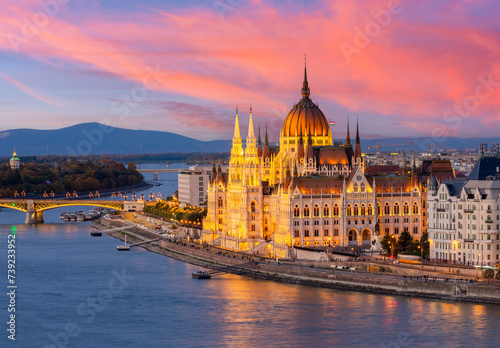 Hungarian parliament building and Danube river at sunset, Budapest, Hungary photo