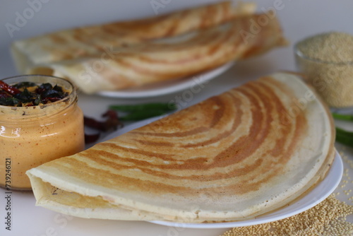 Proso Millet Dosa. South Indian crepe or dosa made with fermented batter of proso millet and lentils photo