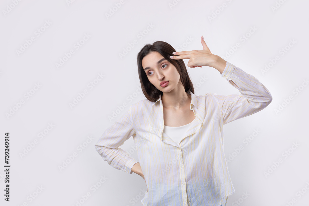 Young beautiful woman with facial expression of surprise standing over white background. Young beautiful woman with facial expression of surprise standing over white background.