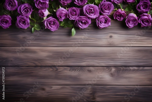 Topdown view of a beautiful purple rose border on a wooden background perfect for floral designs. Concept Floral Design, Topdown Photography, Purple Rose, Wooden Background, Border © Anastasiia