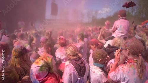 People celebrating holi festival with colors. Holi is a festival of India. 