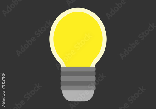 Bombilla encendida en una habitación oscura.