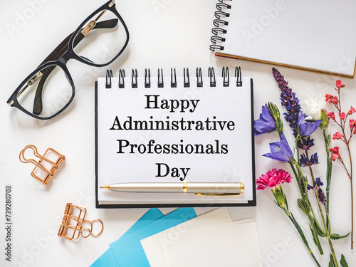 Happy Administrative Professionals Day. Notepad with congratulatory inscriptions. Close-up. Finance and business concept. Congratulations for family, relatives, loved ones, friends and colleagues