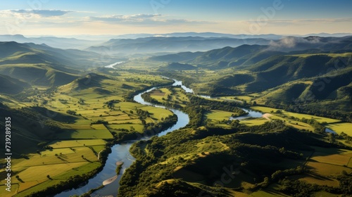 Aerial view of a landscape from a hot air balloon, patchwork fields and rivers below, early morning light, capturing the unique perspective and tranquility of b © ProVector