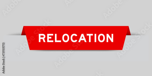 Red color inserted label with word relocation on gray background
