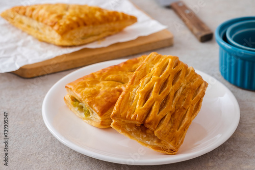 Baked puff pastry on white plate