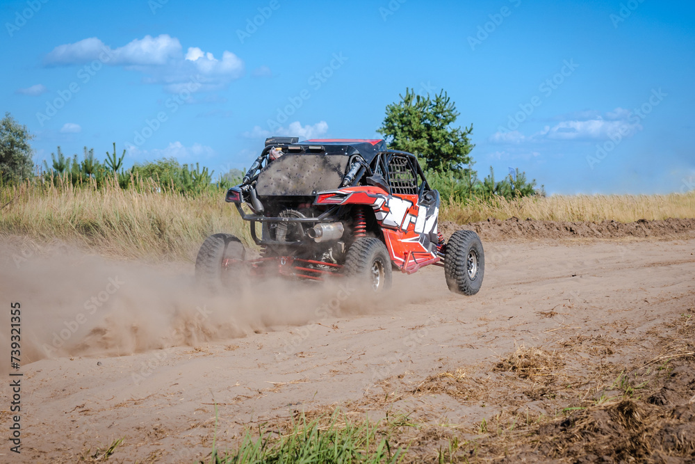 ATV and UTV riding in sandy dusty track. Amateur competitions. 4x4. ATV and UTV riding in sandy dusty track. Amateur competitions. 4x4.