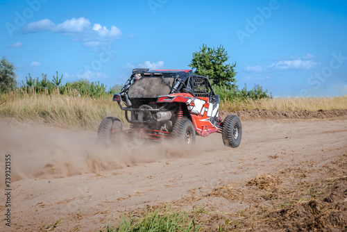 ATV and UTV riding in sandy dusty track. Amateur competitions. 4x4.