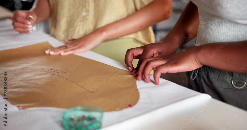 Fashion designer, hands and team sewing pattern on table, manufacturing or production. Tailor, partner and professional with needle on fabric, textile or creative process together in startup business