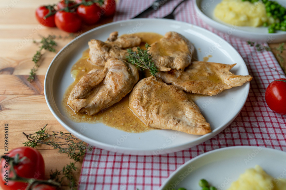 Chicken breast with milk, butter sauce. Delicious italian meal