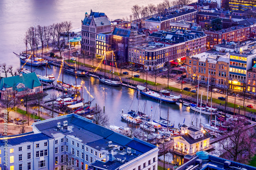 Rotterdam, The Netherlands, February 12, 2024: aerial view of the Ferry Harbour marina during the blue hour after sunset